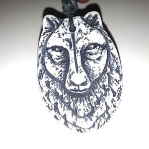 Hand CRAFTED UNISEX wolf charm with adjustable necklace